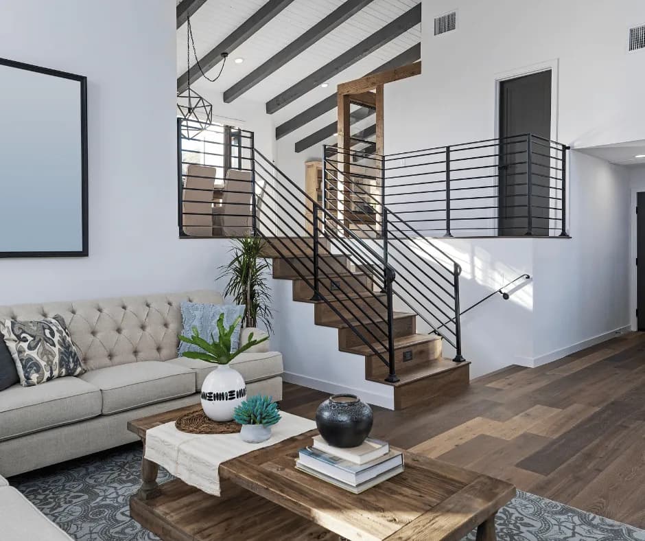 Staged living room with staircase