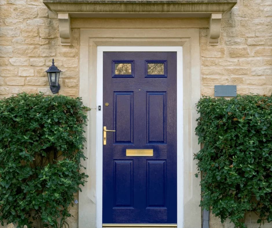 Blue front door of a home